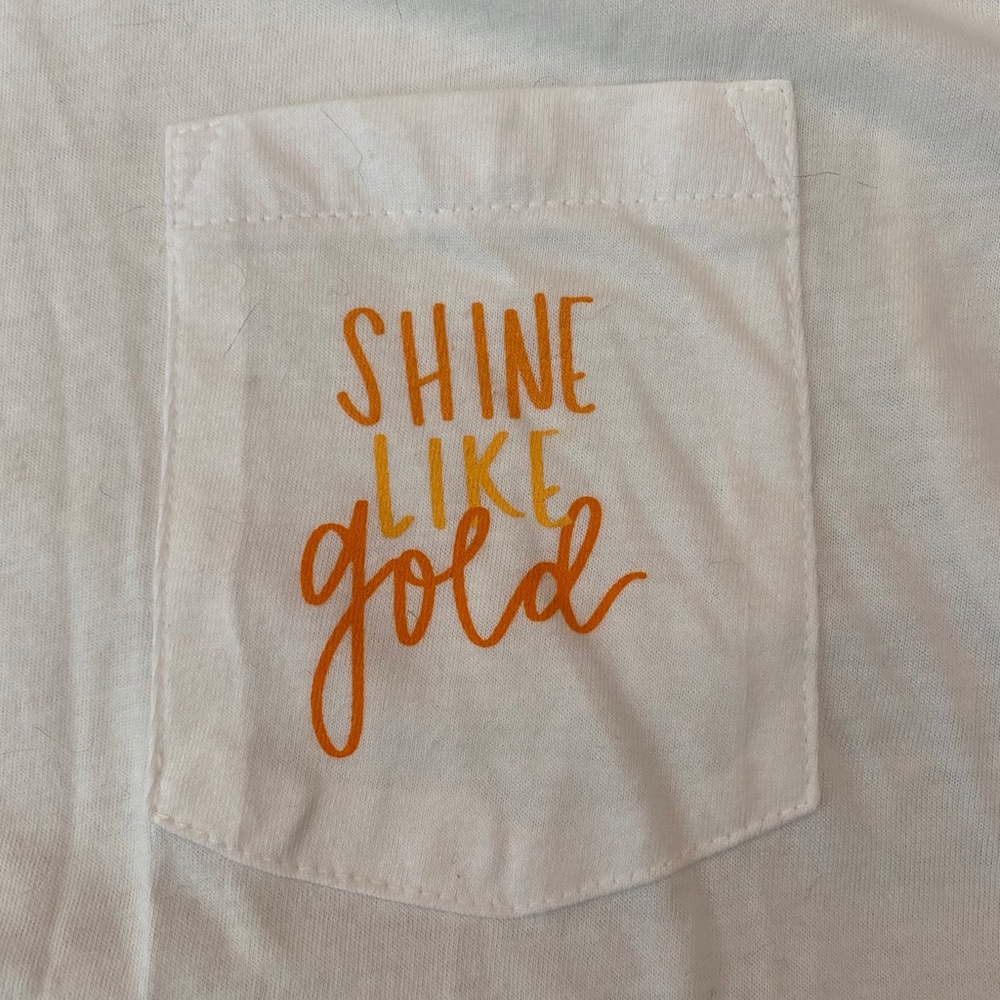 shine like gold pocket tee